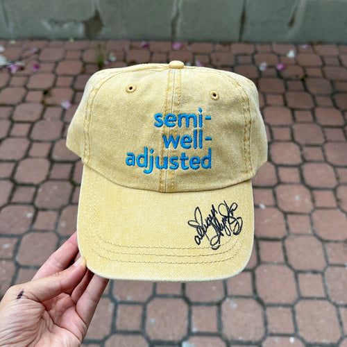 SIGNED by Alyson! (Must add hat to cart separately)